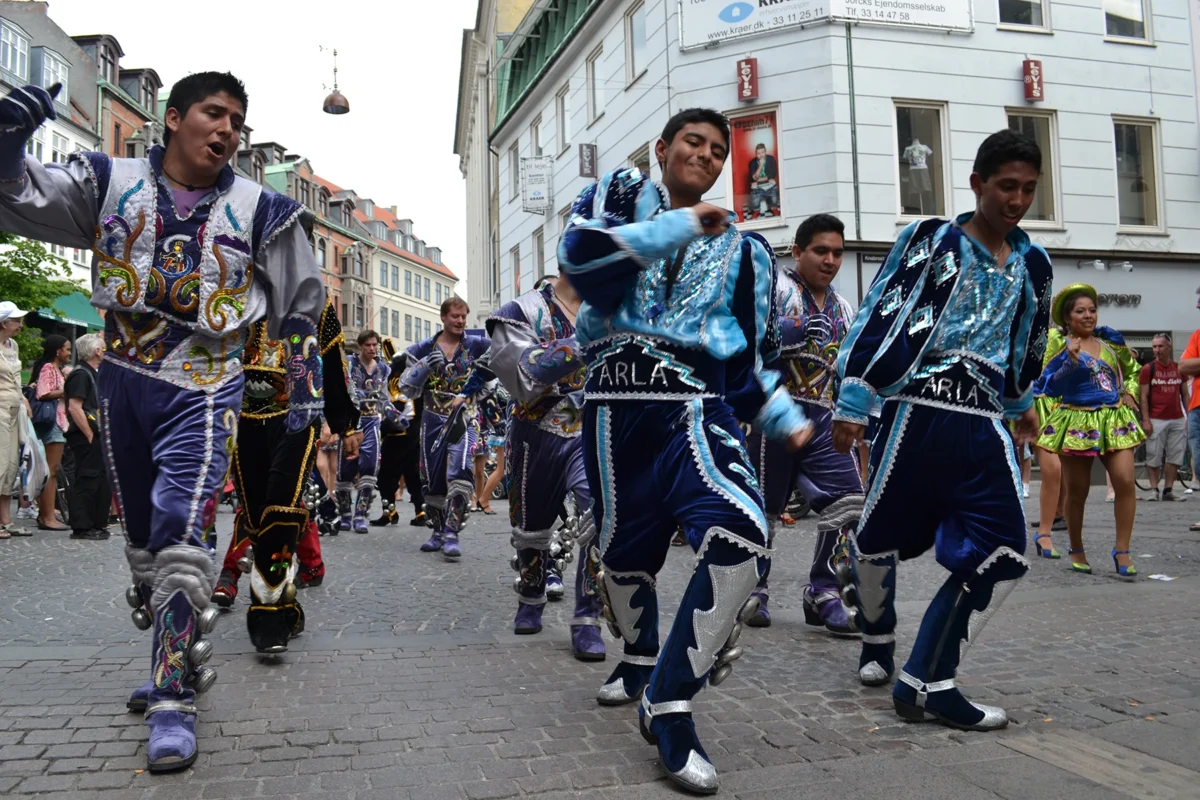 Male dancers of Caporales DK and Caporales Malmo at the Copenhagen Carnival Parade.